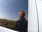SX08974 Self portrait in Ralph the VW T5 campervan window.jpg